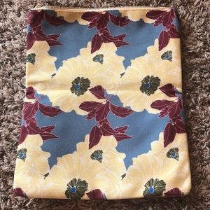 This is a Rachel Pally fold over clutch floral